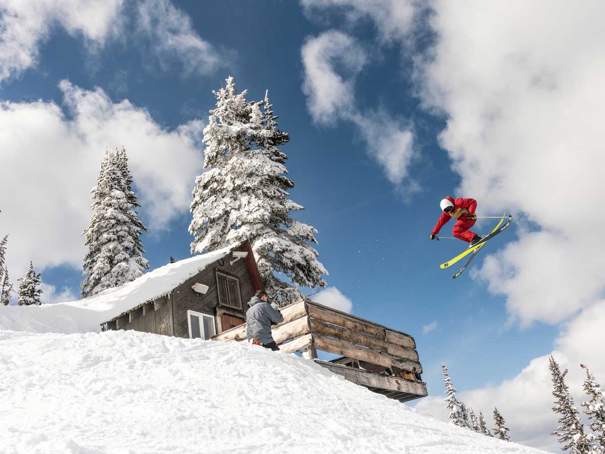 skiing by lodge at RED Mountain, BC