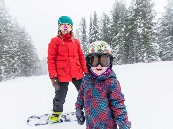 Kids snowboarding.