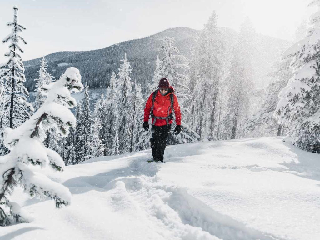 Man Snowshoeing in rossland bc