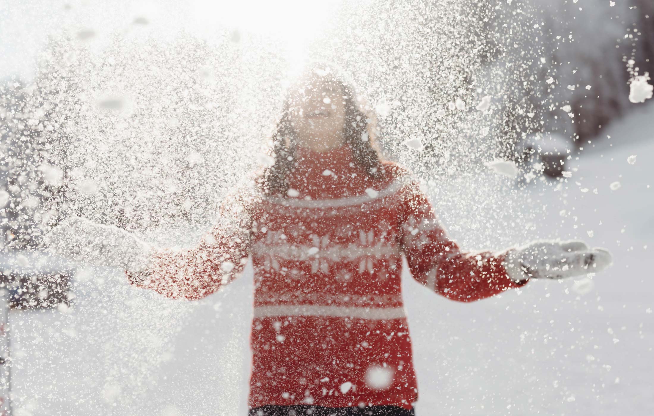 Girl Throwing Snow.