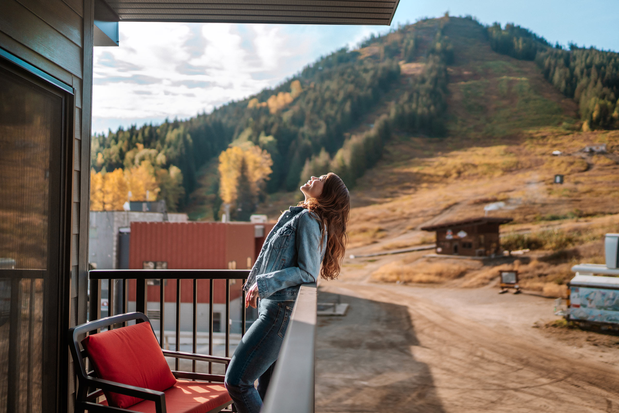 Woman enjoying her stay in the fall at The Josie
